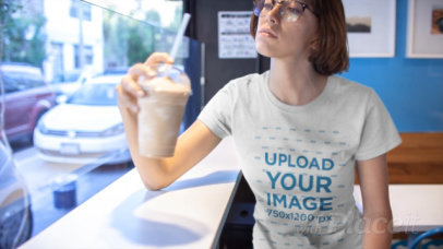 T-Shirt Video of a Young Woman Drinking Iced Coffee