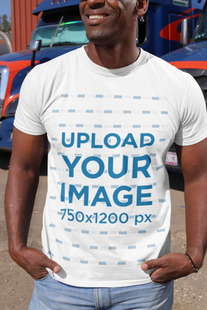 T-Shirt Mockup of a Truck Driver Posing in Front of a Truck