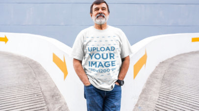 T-Shirt Video of a Senior Man Posing in a Parking Lot 