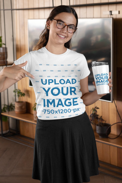 T-Shirt Mockup of a Woman with Lenses Holding a Travel Mug 