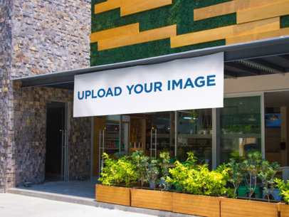 Banner Mockup Hanging From a Restaurant's Entrance a10520
