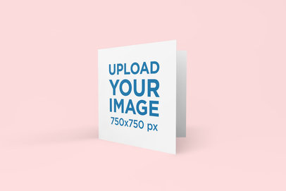 Greeting Card Mockup Featuring a Solid Color Backdrop 