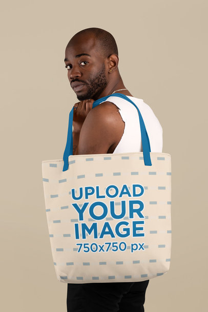 Side Profile Mockup of a Man Carrying a Tote Bag with Customizable Strap