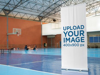 Vertical Banner Mockup at an Indoor Basketball Court a10591