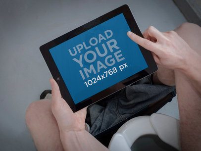  iPad Mockup of a Man in the Toilet 