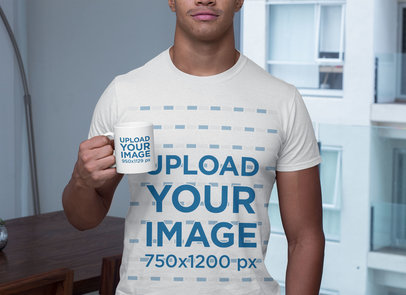 Mockup of a Man with a Crewneck T-Shirt Holding an 11 oz Coffee Mug