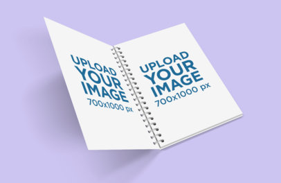 Mockup Featuring an Open Spiral Notebook Against a Plain Background 