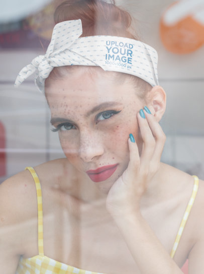 Pinup Bandana Mockup Featuring a Woman Looking at the Camera Through a Glass Window