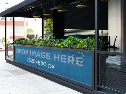 Horizontal Banner Mockup in the Street Outside a Bar 