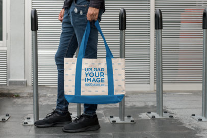 Weekend Bag Mockup of a Man Standing by Some Bike Racks 29799