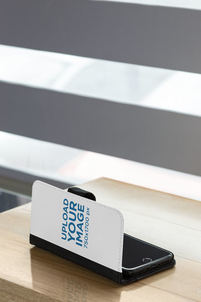 Mockup of a Wallet Case for iPhone 11 Lying on a Table 29810
