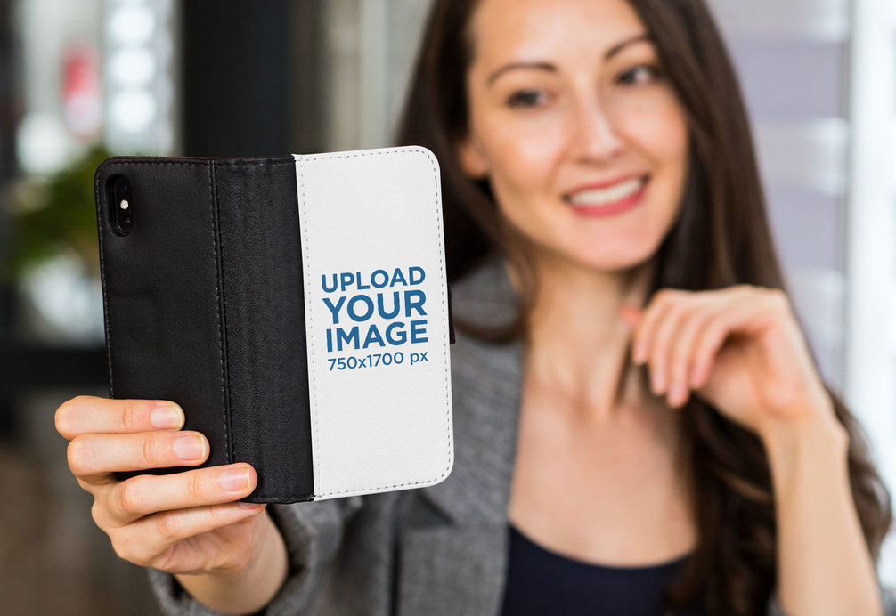 Wallet Case Mockup of a Woman Taking a Selfie with Her iPhone X 