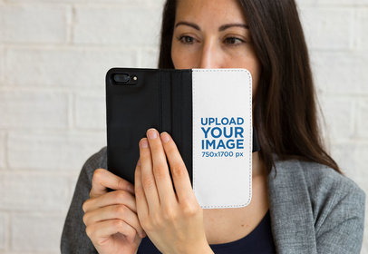Mockup of a Woman Holding a Wallet Case for iPhone 7 Plus 29805