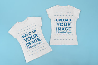 Mockup of Two Matching T-Shirts Placed over a Flat Surface