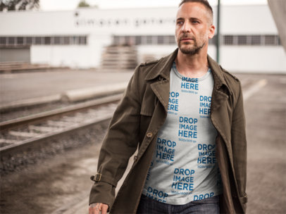  T-Shirt Mockup of a Handsome Man at a Construction Site