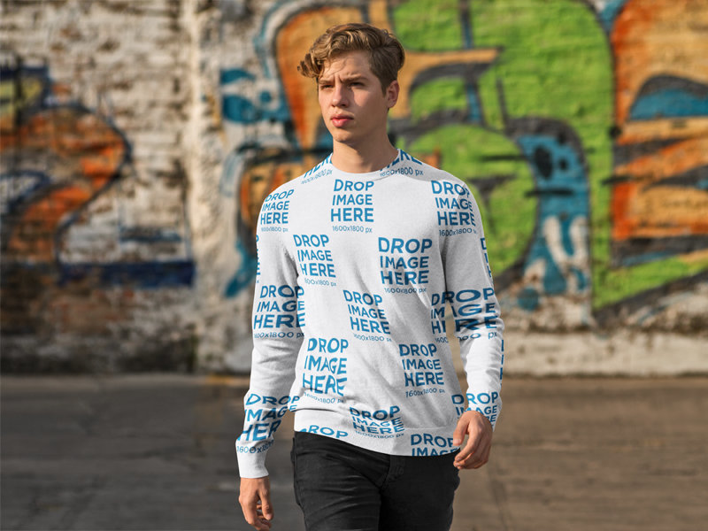 Crewneck Mockup Featuring a Young Man in a Parking Lot