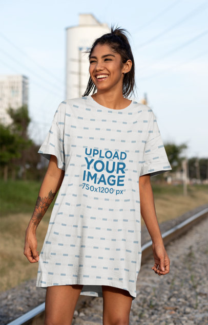 Mockup of a Woman in a Shift Dress Walking in the Railroads 29734