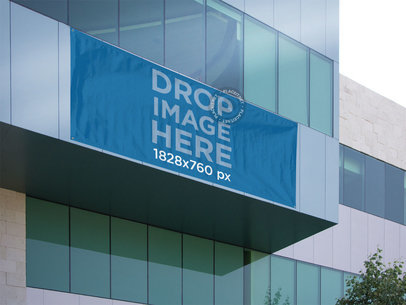 Horizontal Banner Mockup on a Glass Building