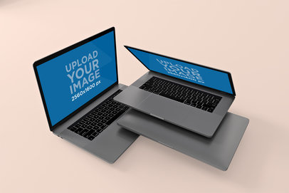 Mockup of Two Piled MacBook Pro Inside a Minimalistic Setting 573-el