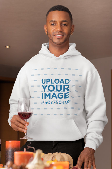 Mockup of a Man with Piercings Wearing a Pullover Hoodie During Thanksgiving 