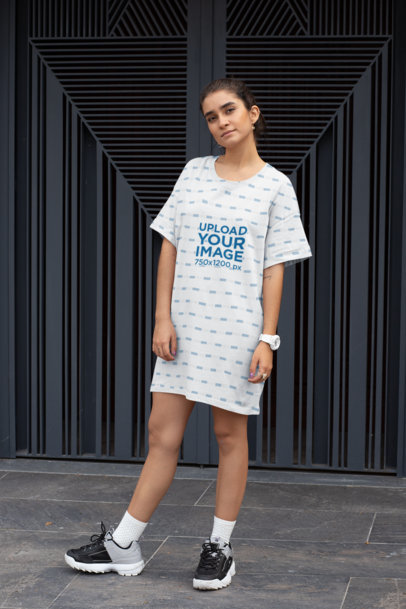 Shift Dress Mockup Featuring a Woman Posing in Front of a Dark Metallic Door 29751