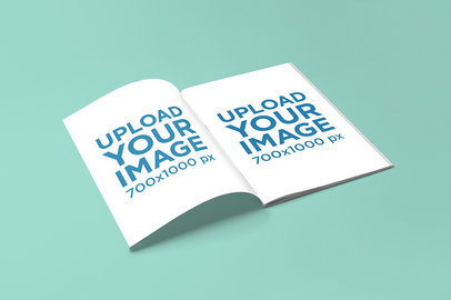 Mockup of an Open Magazine on a Solid Color Surface
