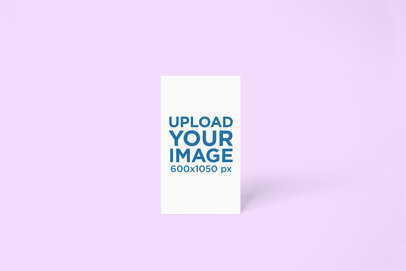 Minimal Mockup Featuring a Vertical Business Card Standing Against a Solid Color Backdrop 