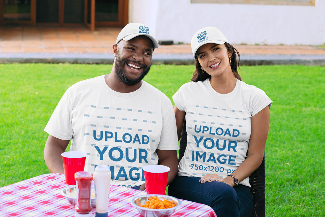 T-Shirt Mockup Featuring a Couple with Customizable Dad Hats