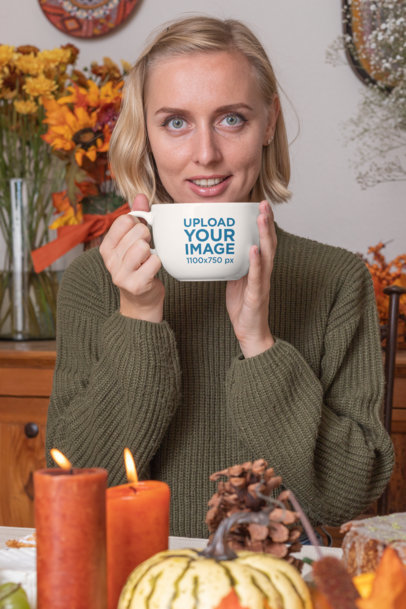 24 oz Coffee Mug Mockup Featuring a Woman at a Thanksgiving-Set Table 29940