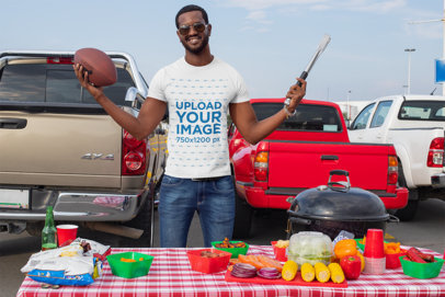 T-Shirt Mockup of a Happy Man at a Tailgate Party 