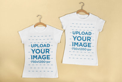 Flat Lay Mockup of Two Women's T-Shirts on Hangers 