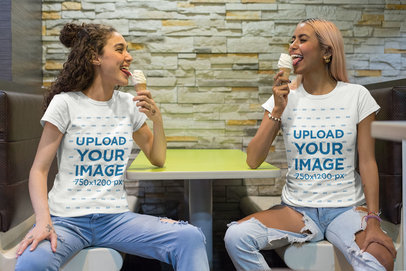 Mockup of Two Best Friends Wearing Customizable T-Shirts While Eating an Ice Cream 