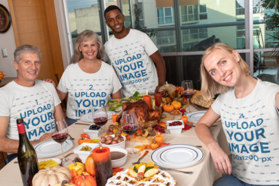 Mockup of a Family Wearing Customizable T-Shirts at a Thanksgiving Dinner