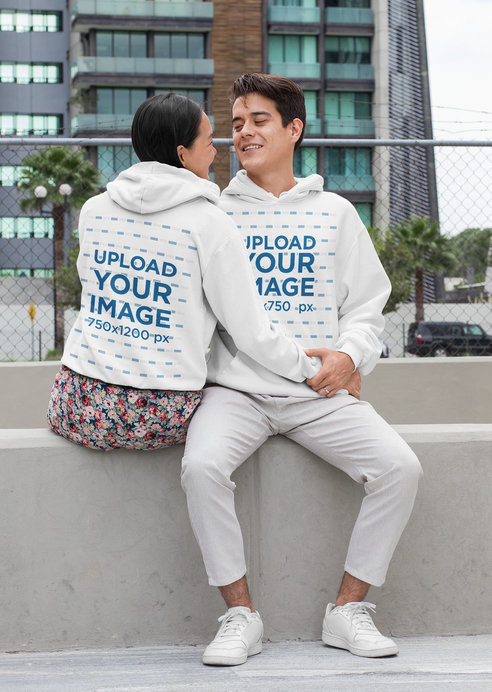Front and Back Hoodie Mockup Featuring a Tender Couple 