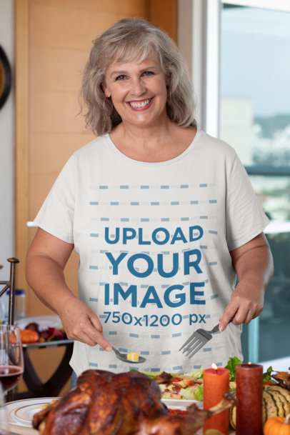 T-Shirt Mockup Featuring an Elderly Woman Setting the Table for Thanksgiving Dinner