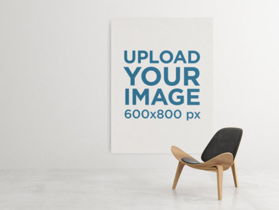 Mockup of an Art Print at a Minimalist Space with a Modern Chair