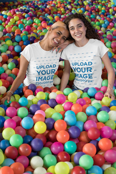 T-Shirt Mockup of Two Best Friends Playing in a Ball Pit 29628