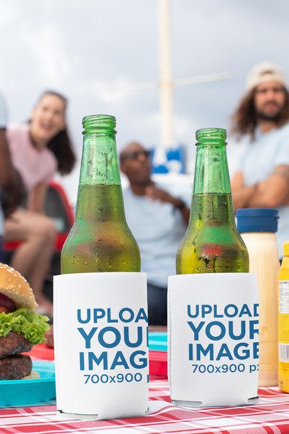 Mockup of Two Beers in Koozies at a Tailgate Party 29896