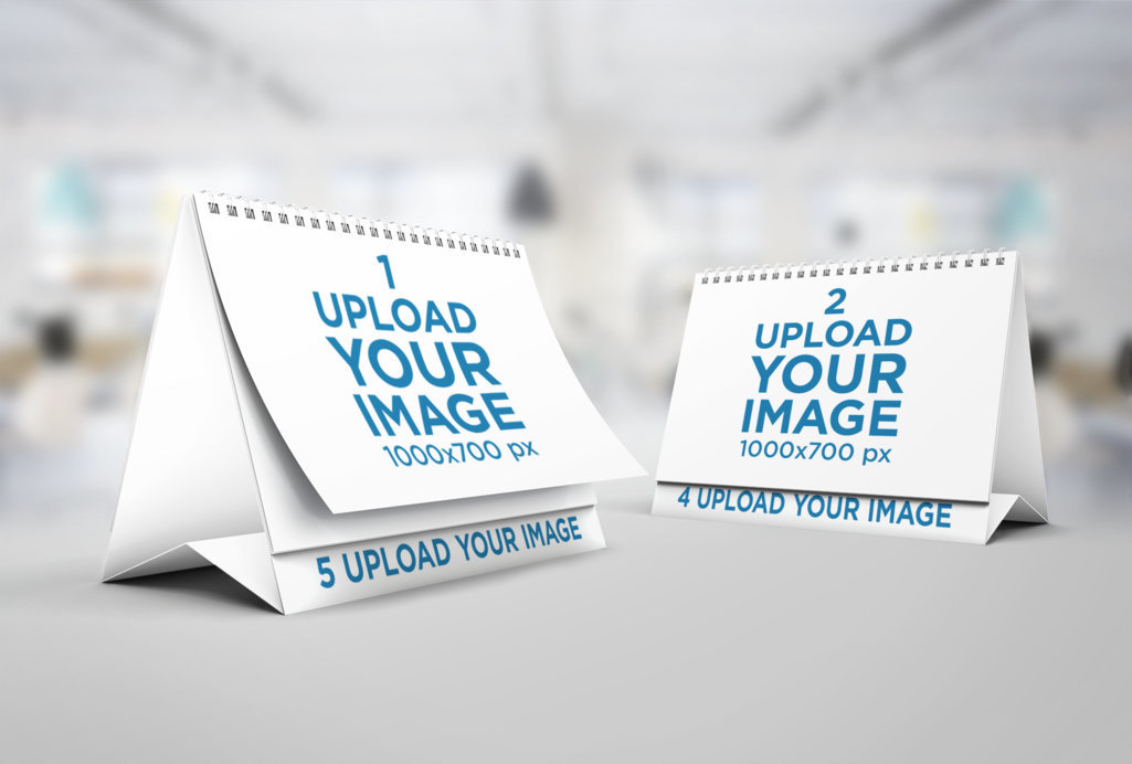 Placeit - Mockup of Two Desk Calendars Standing Next to Each Other