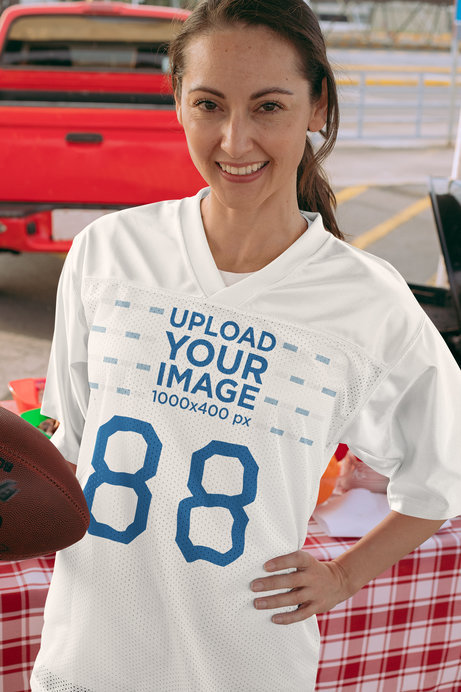 Mockup of a Woman with an Oversized Jersey at a Tailgate Party