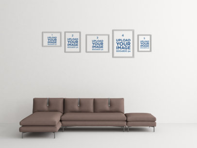 Mockup Featuring Five Art Prints Hanging over a Modern Fabric Couch 