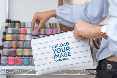 Pouch Mockup of a Woman Selecting Her Makeup
