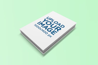 Mockup of a Book Placed on a Solid Color Surface 