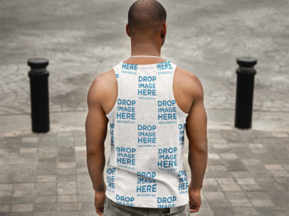Back Shot Mockup of a Black Man Wearing a Tank Top Walking on the Street