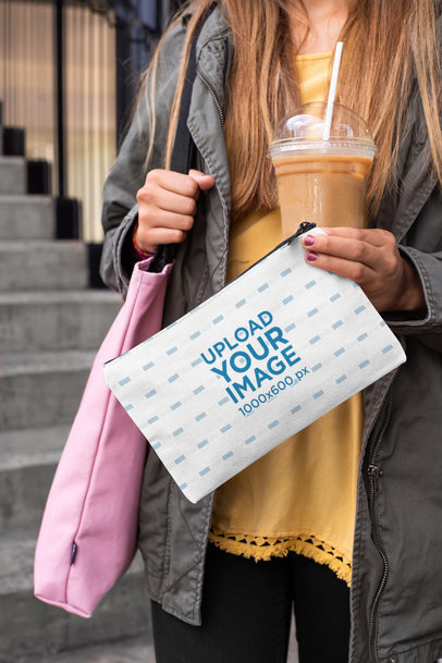 Pouch Mockup Featuring a Woman Holding a Frappe