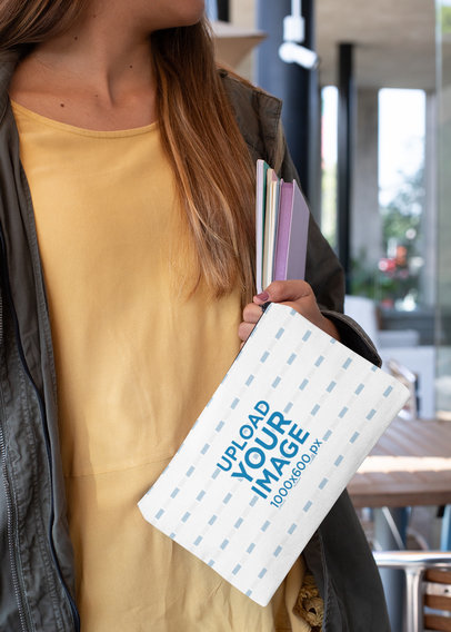 Mockup Featuring a Woman Holding a Pouch 29979
