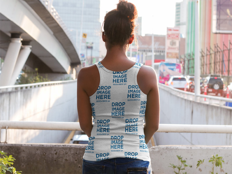 Back of a Mom to Be Wearing a Sublimated Tank Top Mockup on a Bridge