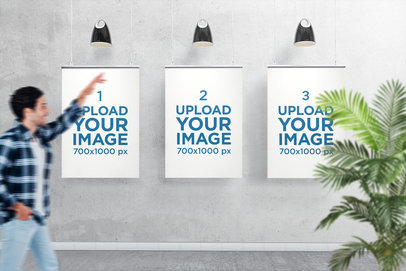 Mockup of Three Posters Displayed Against a Concrete Surface