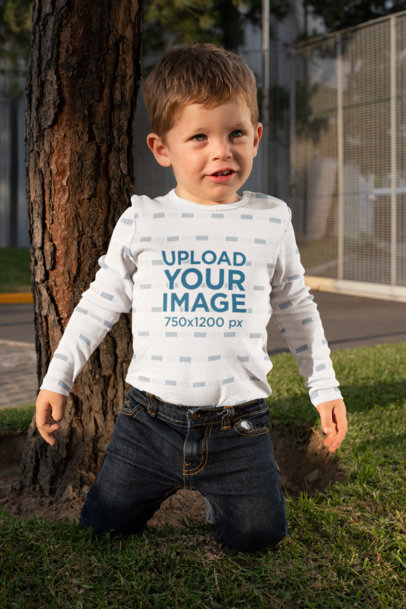 Mockup of a Boy in a Onesie Playing in the Backyard