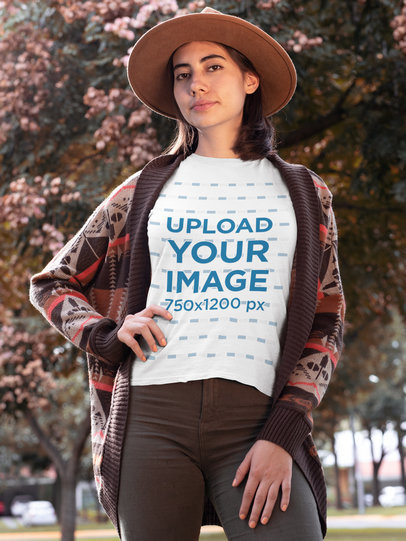 T-Shirt Mockup of a Stylish Woman with Trees in the Background